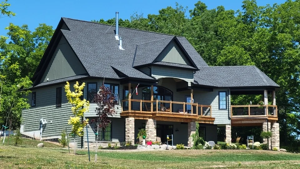 New construction project featuring roofing in Binbrook with GAF Timberline HDZ shingles in charcoal. Modern home in a developing neighbourhood with high-performance materials.